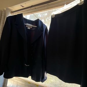 Navy women’s suit jacket and skirt